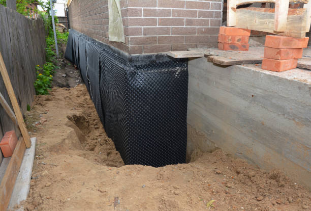 Happy homeowners after waterproofing job in Winona Lake